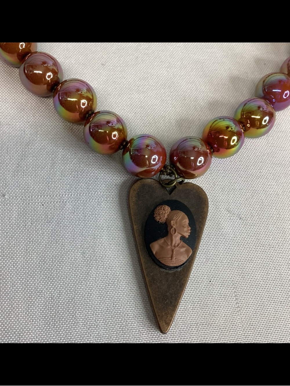 Iridescent Copper Beaded Necklace with Cameo Pendant.1